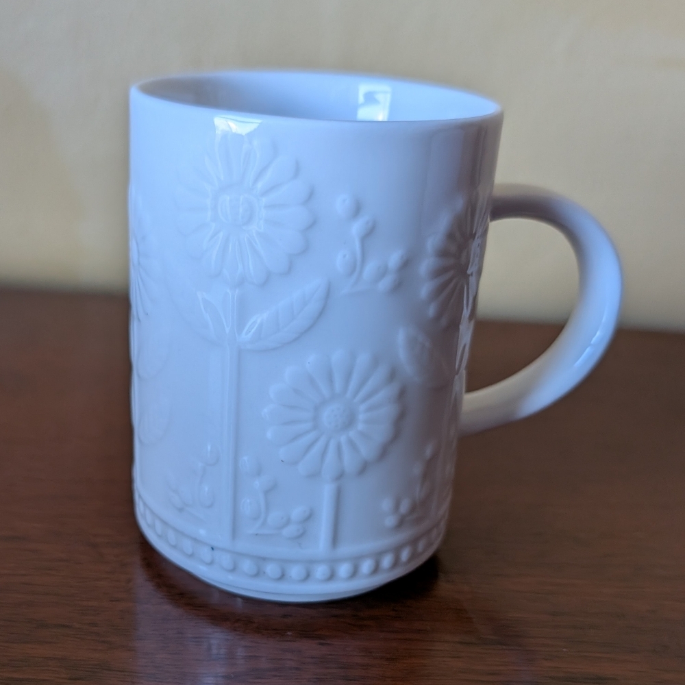 Set Of 2 Starbucks Daisy Mugs 12 oz Embossed Ivory Color